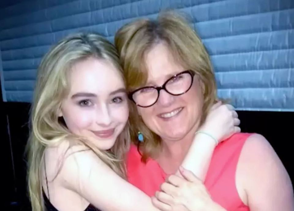 Sabrina Carpenter hugging Nancy Cartwright.