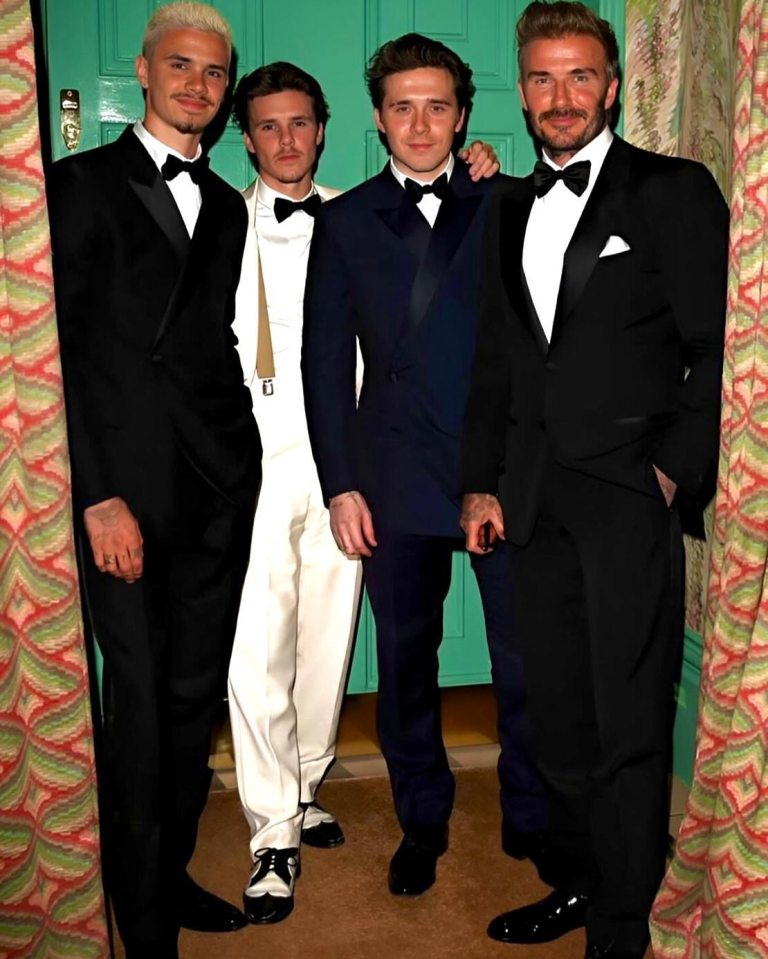 Four men in formal wear.