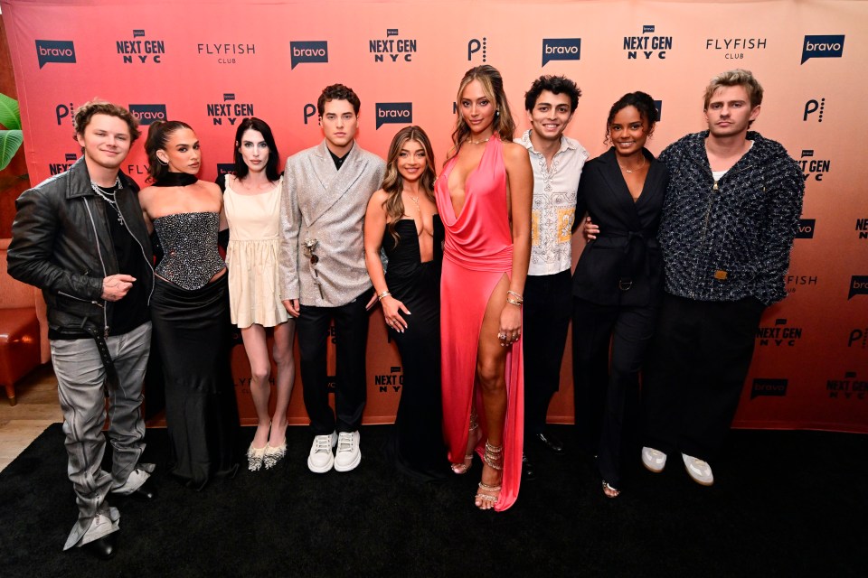 Group photo of the cast of Bravo's Next Gen NYC at a premiere party.