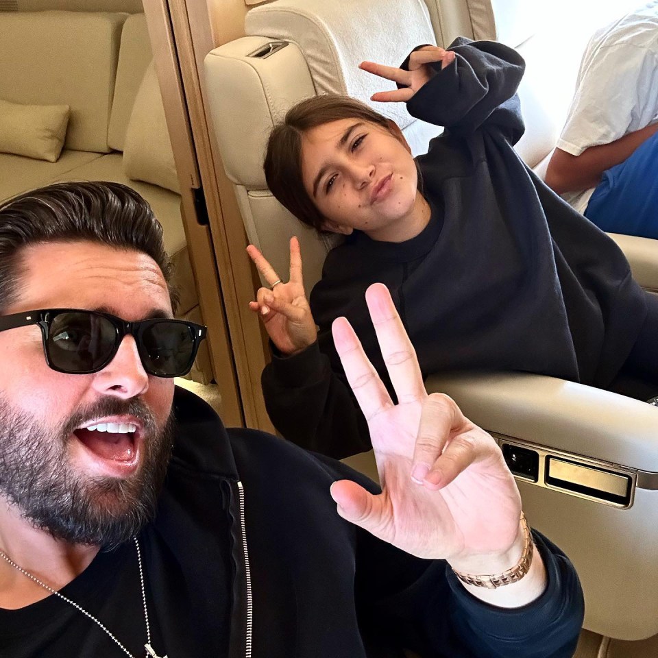 Penelope Disick and Scott Disick on a private jet.
