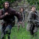 Aaron Taylor-Johnson and Alfie Williams run from rage-infected people in 28 Years Later.