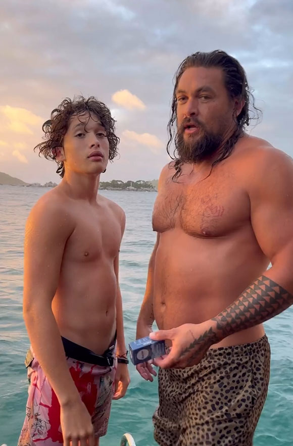 Jason Momoa and his son on a boat.