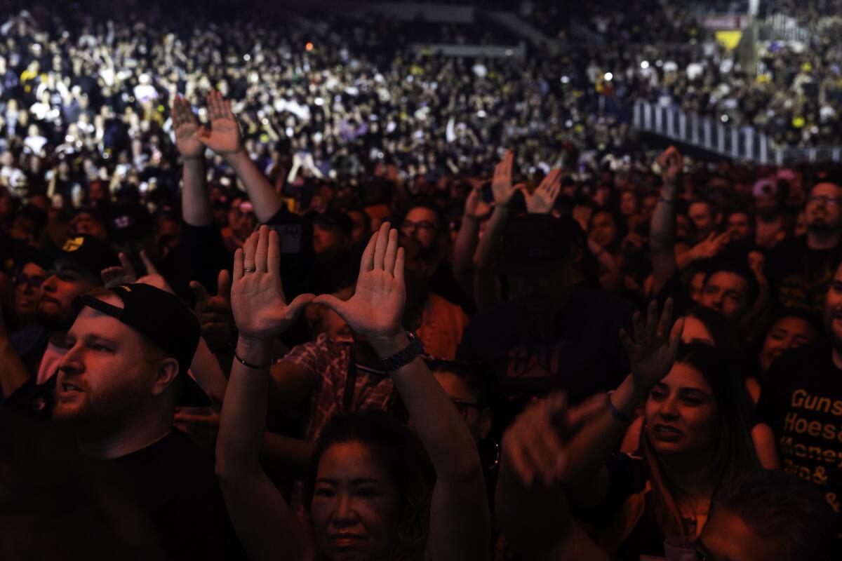Fans of Wu-Tang Clan cheer as they perform at Crypto.com Arena
