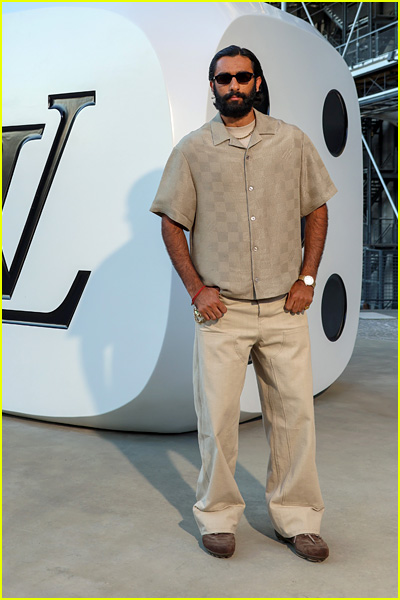 celebs at louis vuitton fashion show