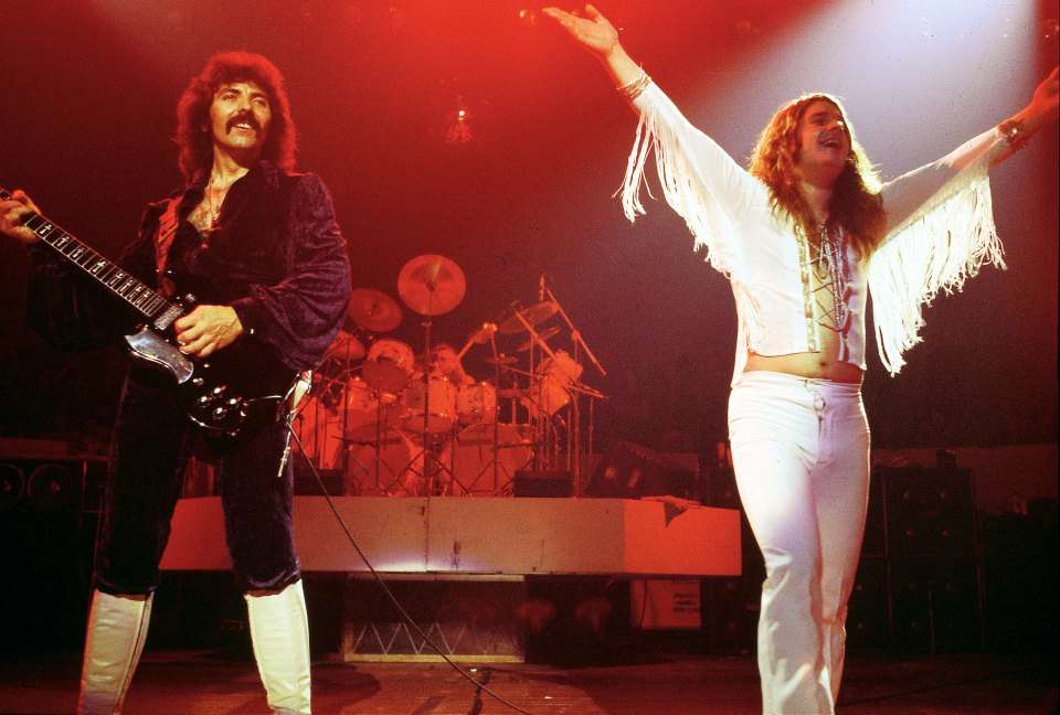 Black Sabbath's Tony Iommi and Ozzy Osbourne performing live on stage.