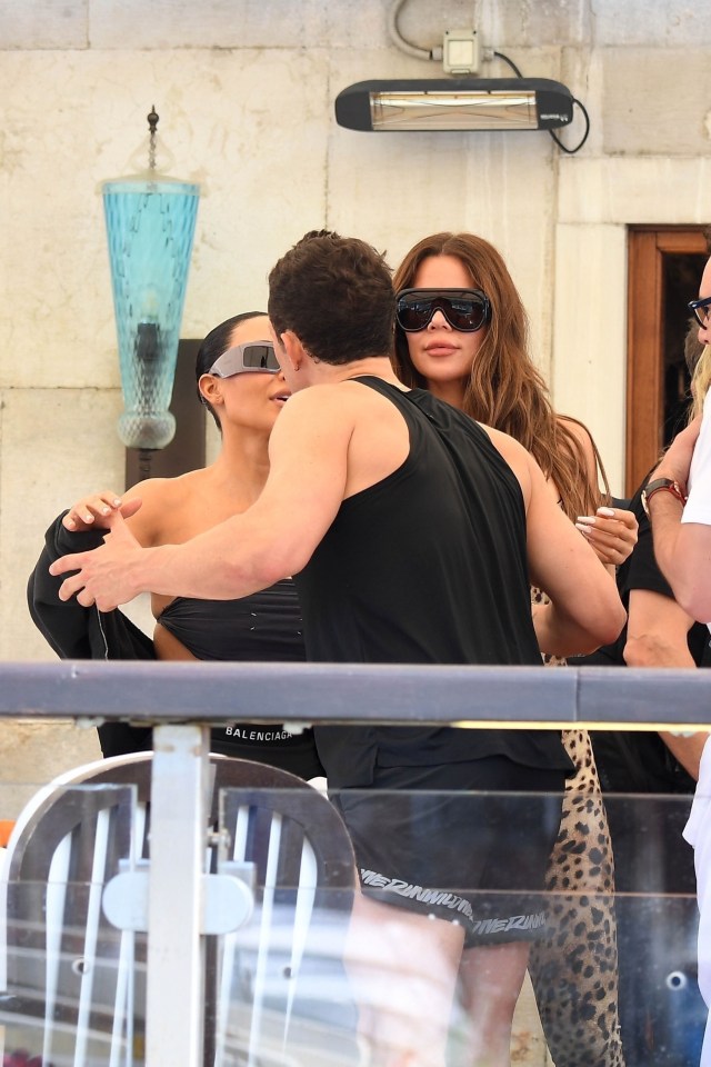 Kim Kardashian and Khloe Kardashian with Orlando Bloom and Scooter Braun in Venice.