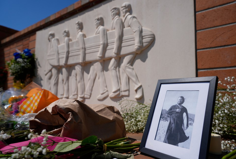 Photo of Brian Wilson at a Beach Boys monument.