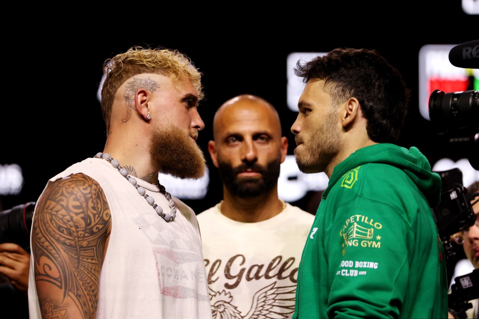 Jake Paul and Julio Cesar Chavez Jr. facing off before a boxing match.