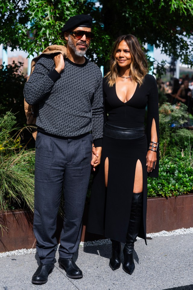 Van Hunt and Halle Berry attending a fashion show.