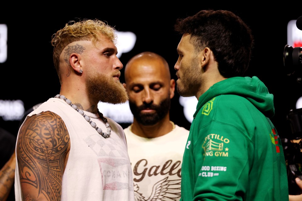 Jake Paul and Julio Cesar Chavez Jr. face off at a press conference.