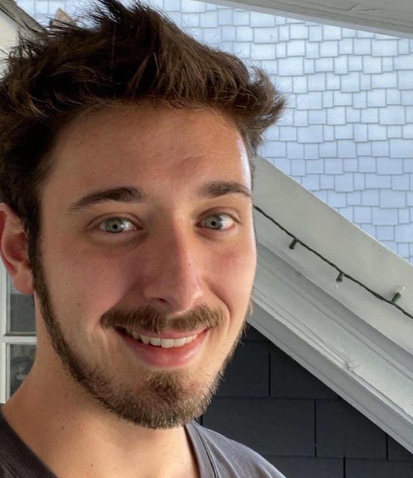 Close-up photo of Julian, Lisa Kudrow's son, smiling.