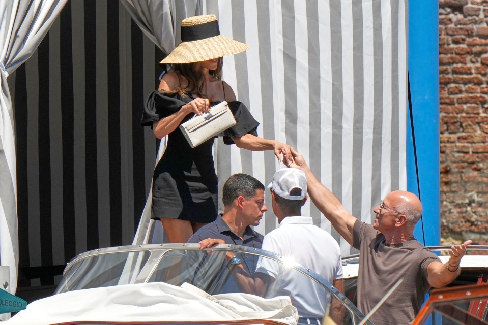 Lauren Sanchez and Jeff Bezos leaving their hotel in Venice.