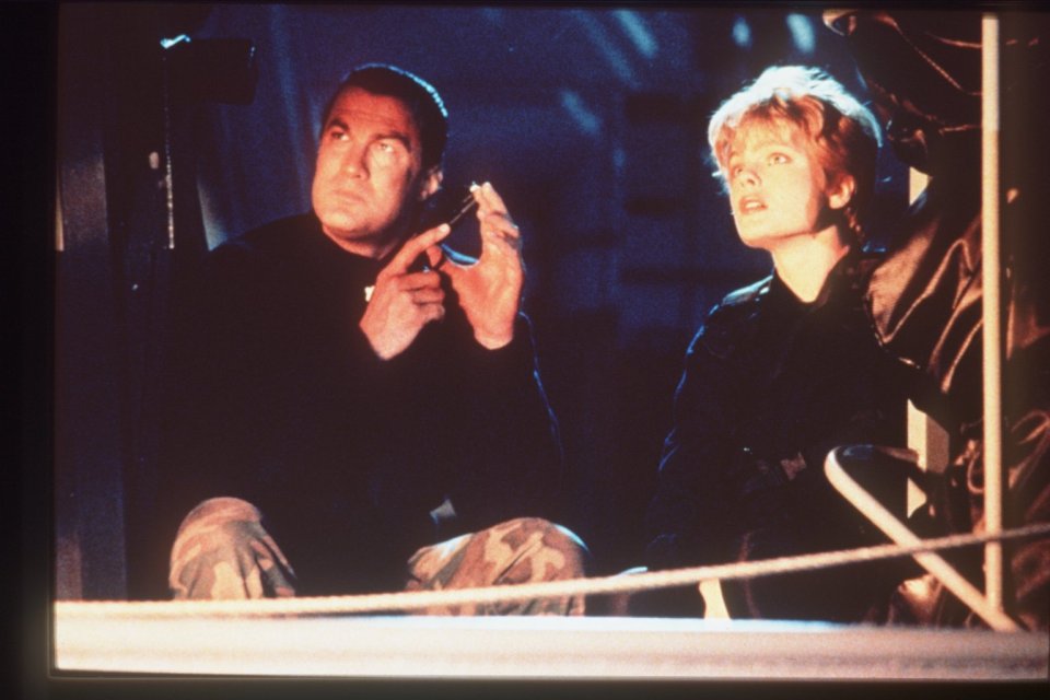 Scene from the film *Under Siege* starring Steven Seagal and Erika Eleniak.