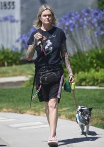 Erika Eleniak walking her dog.