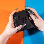 A photo of the NIntendo Switch 2’s Joy-Con controllers in their controller grip.