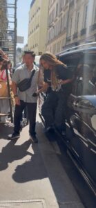 Jay-Z and Blue Ivy exiting a vehicle in Paris.