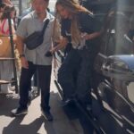 Jay-Z and Blue Ivy exiting a vehicle in Paris.