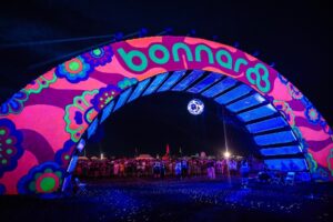 Bonnaroo Music & Arts Festival archway at night.