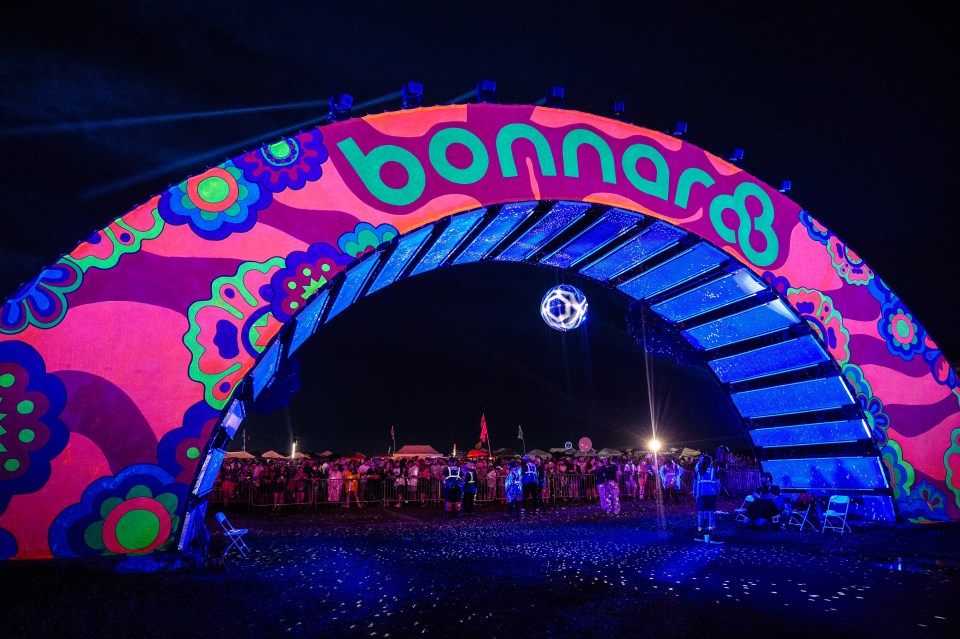 Bonnaroo Music & Arts Festival archway at night.