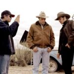 Director Ang Lee, Heath Ledger and Jake Gyllenhaal on the set of the movie Brokeback Mountain