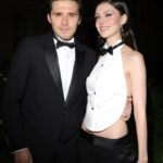 Brooklyn Beckham and Nicola Peltz at a fashion week event.