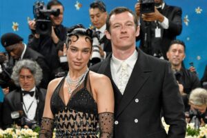 Dua Lipa pictured with her fiancé, Callum Turner.