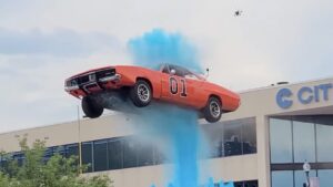 Dukes of Hazzard car jumps over 150ft fountain in front of massive crowd