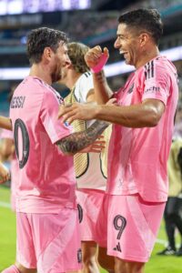 Luis Suarez celebrates scoring his team's second goal with Lionel Messi of Inter Miami CF during the FIFA Club World Cup 2025 group A match between Internacional CF Miami and SE Palmeiras at Hard Rock Stadium on June 23, 2025 in Miami Gardens, Florida. (Photo by Rodolfo Buhrer/Sports Press Photo/Getty Images)