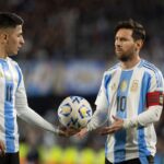 Argentina's Lionel Messi and Thiago Almada participate in the 2026 FIFA World Cup South American qualifiers football match between Argentina and Colombia at the Mas Monumental stadium in Buenos Aires, Argentina, on June 10, 2025