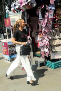 Vanessa Williams at a souvenir stand in Trafalgar Square.