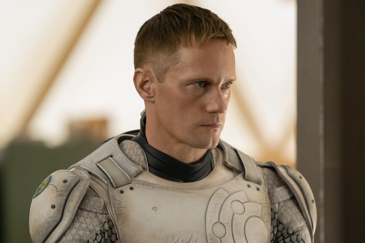A man in a white futuristic armor.