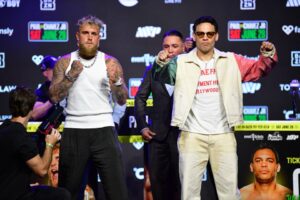 Jake Paul and Julio Cesar Chavez Jr. at a press conference.