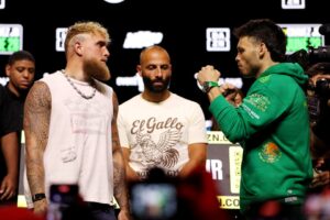 Jake Paul and Julio Cesar Chavez Jr. face off at a press event.