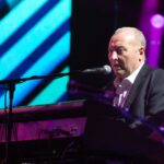James Prime of Deacon Blue performing on stage.