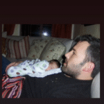 Garner posted a sweet photo of Affleck holding one of the couple's children as a newborn.
