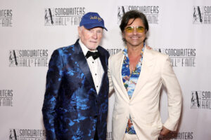 Mike Love and John Stamos at the 2025 Songwriters Hall of Fame Induction Ceremony