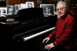 Grammy Award-winning composer Lalo Schifrin at his piano.