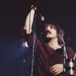 Terry Luttrell of Starcastle performing live on stage.
