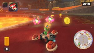 Image may contain Ball Football Soccer Soccer Ball Sport Car Transportation Vehicle Game and Super Mario