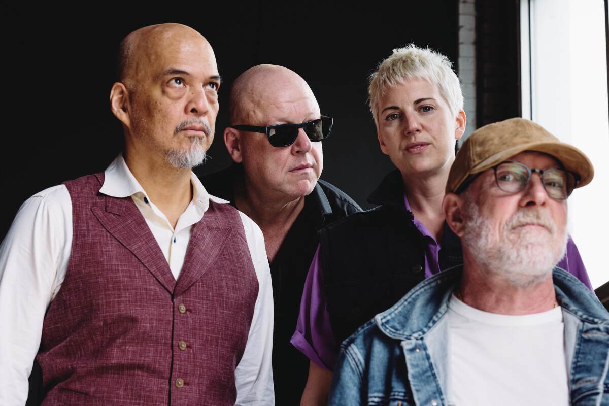 From left to right, Joey Santiago, Black Francis, Emma Richardson, and David Lovering of the Pixies pose for a photo.