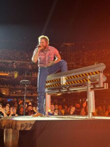 Post Malone performing on stage.