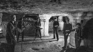 Queens of the Stone Age Release Alive in the Catacombs Concert Film