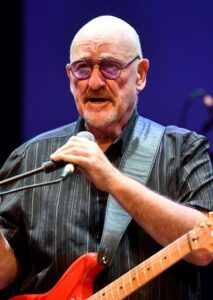 Dave Mason, Rock and Roll Hall of Fame inductee, performing onstage.