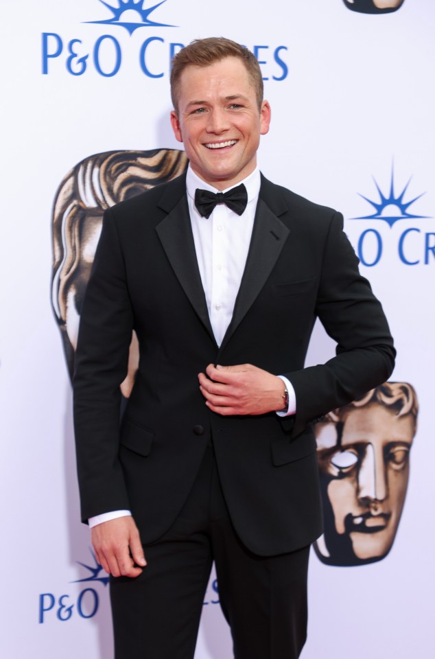 a man in a tuxedo is standing on a red carpet that says p & o cruises
