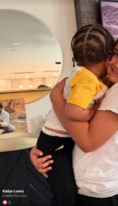 Kailyn Lowry hugging a child.