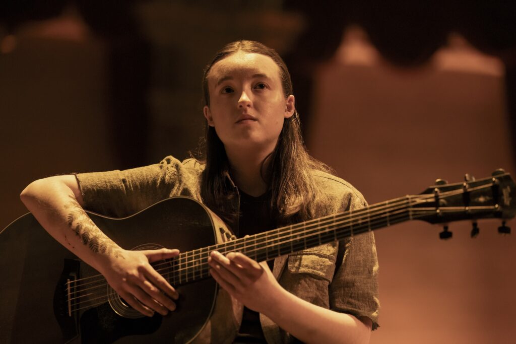 A still photo of Bella Ramsey in the HBO series The Last of Us.