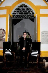 Tim Burton poses during a masterclass ahead the inauguration of the immersive experience 'Laberinto' at Panteon Dolores on June 24, 2025 in Mexico City, Mexico. (Photo by Medios y Media/Getty Images)