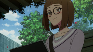 Sam sitting in a park with her laptop in Let’s Play