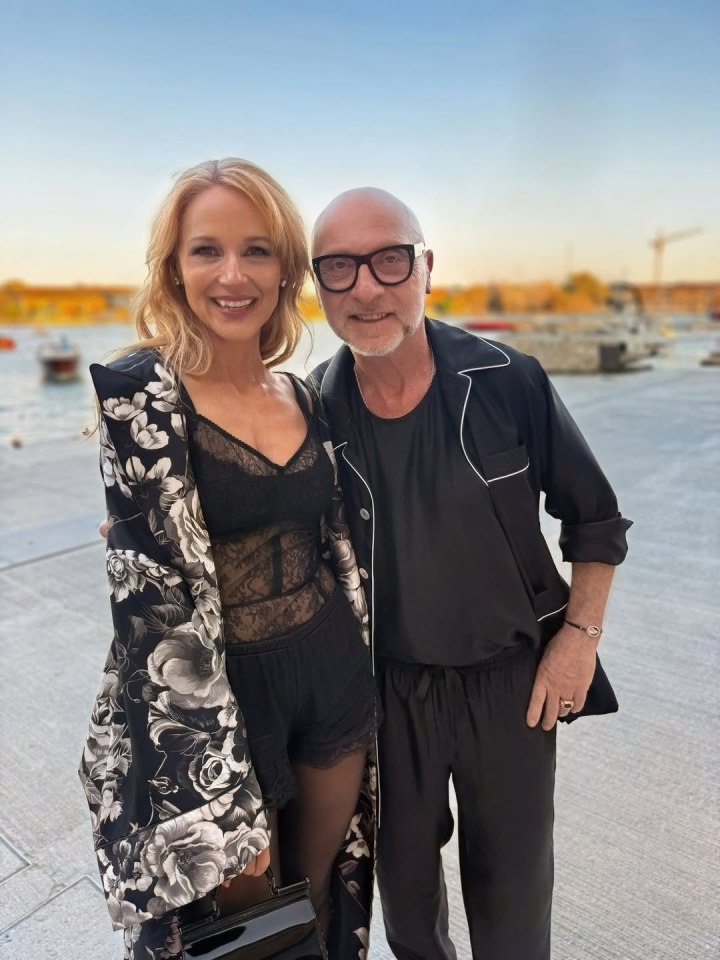 A woman and a man posing for a photo.