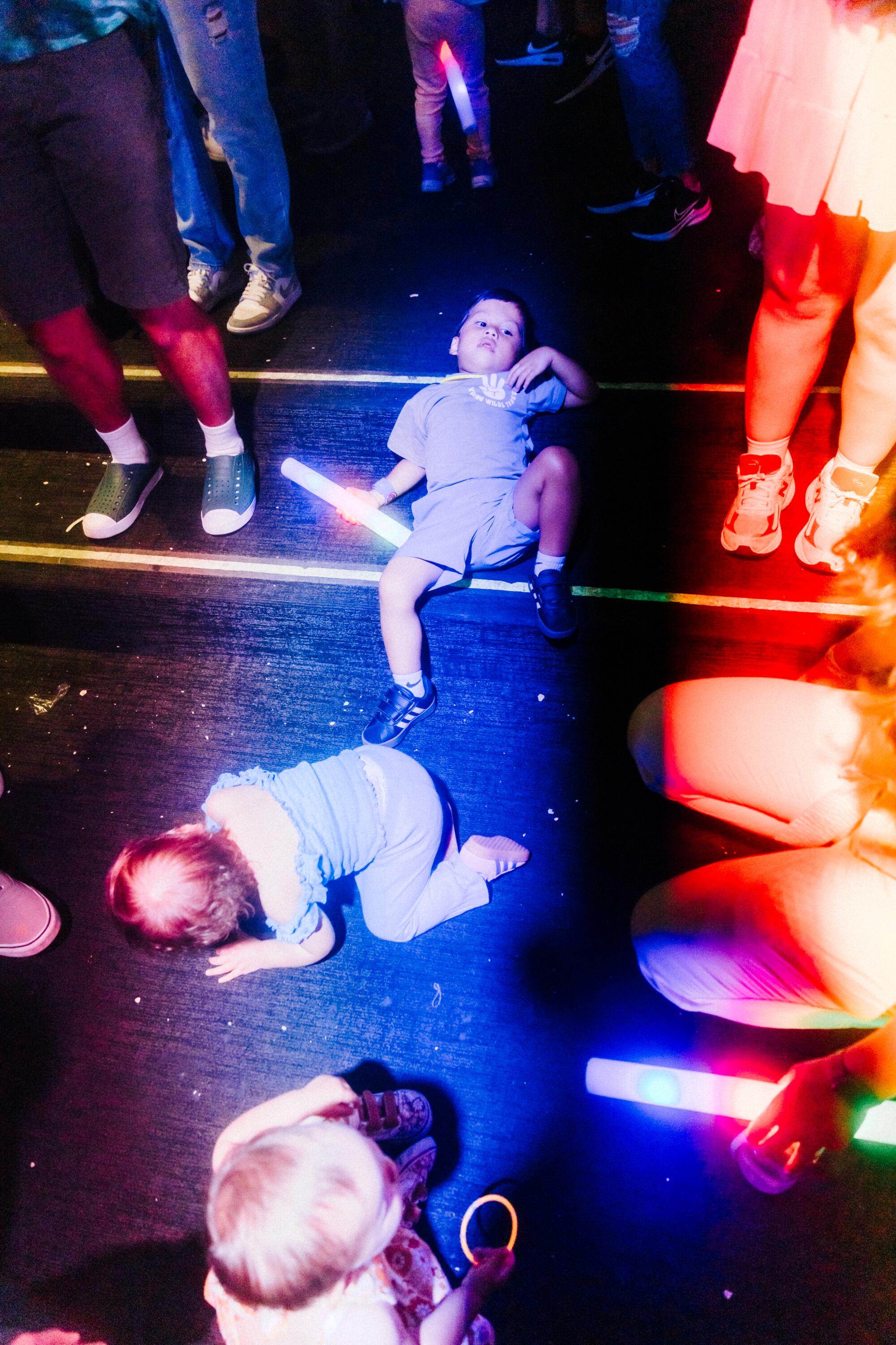 Babies and toddlers at a rave.
